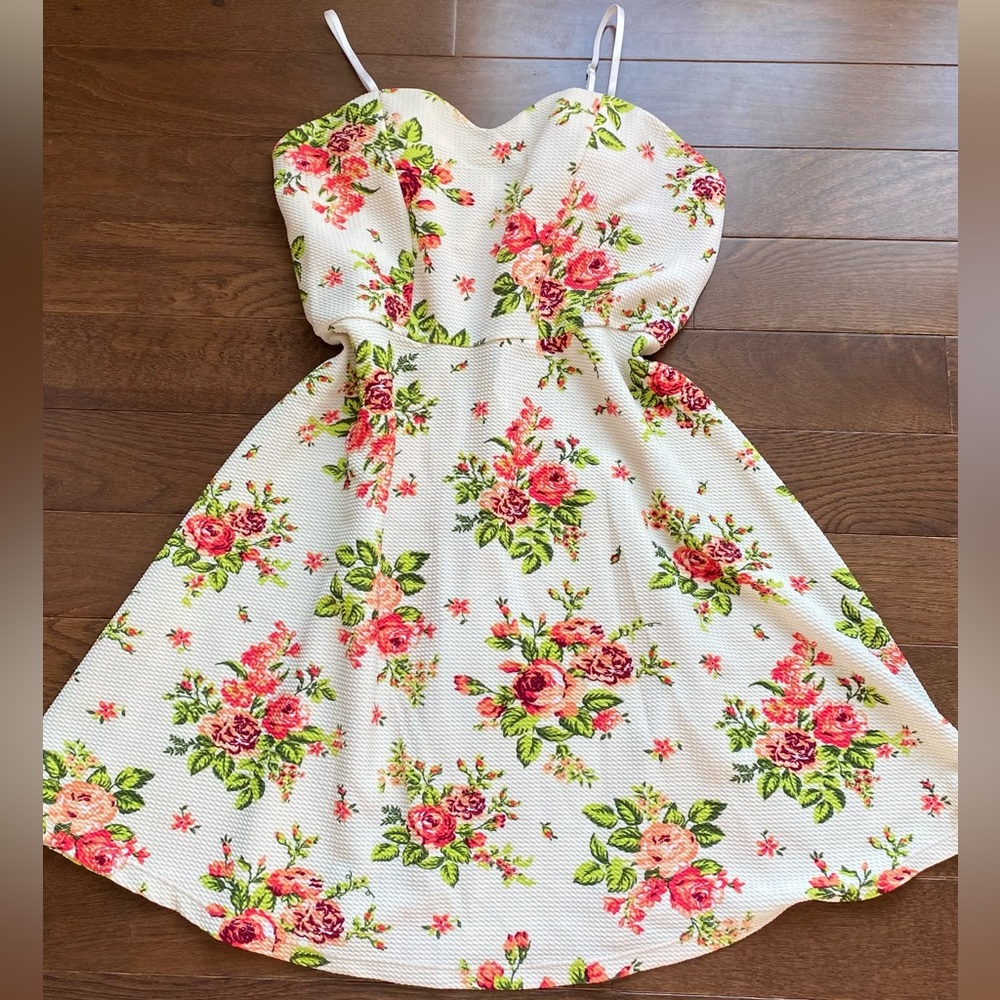 floral patterned dress in size medium with built in bra cups